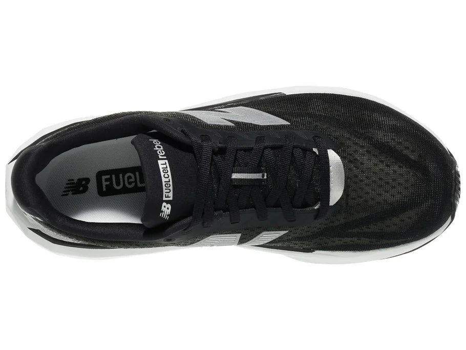 Men's New Balance Rebel v5. Black upper. White midsole. Top view.