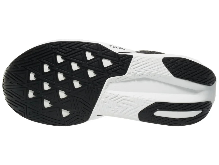 Men's New Balance Rebel v5. Black upper. White midsole. Bottom view.