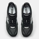 Men's New Balance Rebel v5. Black upper. White midsole. Top view.