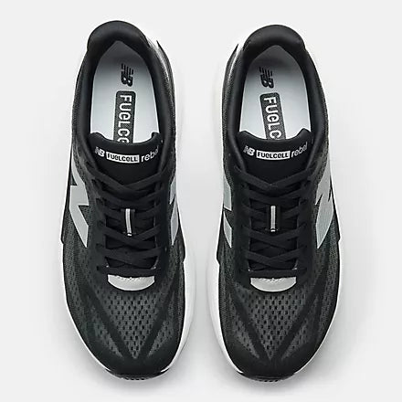 Men's New Balance Rebel v5. Black upper. White midsole. Top view.
