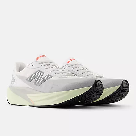 Men's New Balance Rebel v5. Grey upper. Off White midsole. Lateral view.
