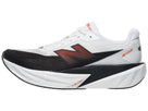 Men's New Balance FuelCell Rebel v5. White/Black upper. White/Black midsole. Lateral view.