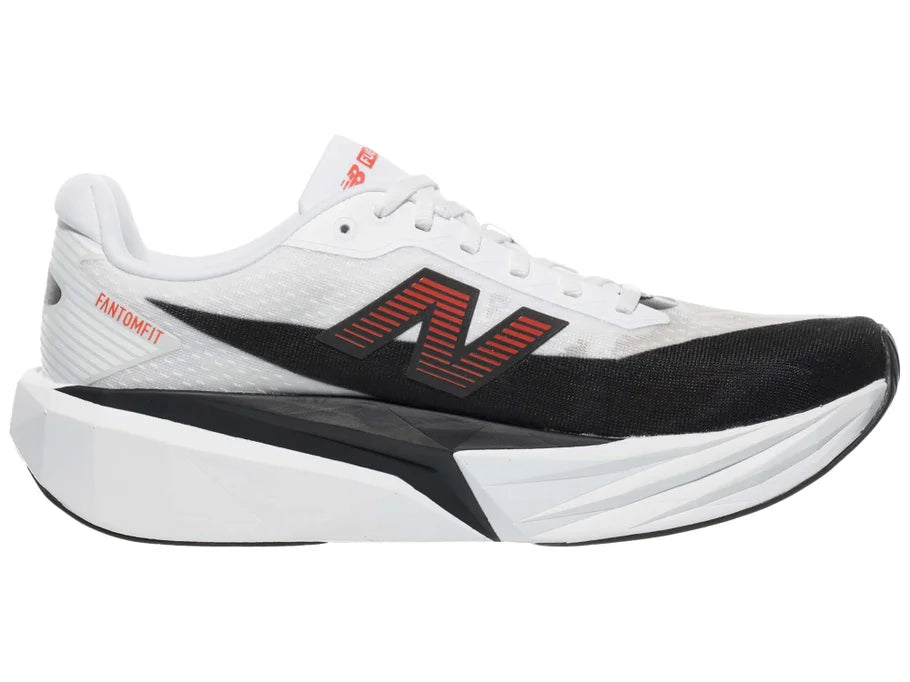 Men's New Balance FuelCell Rebel v5. White/Black upper. White/Black midsole. Medial view.