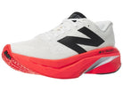 Men's New Balance FuelCell SuperComp Trainer v3. Urgent Red/Sea Salt/Black. Lateral view.