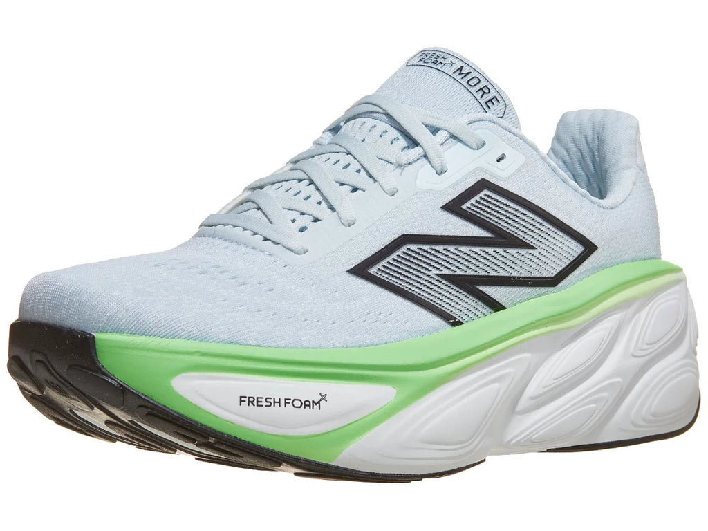 Men's New Balance More v5. Light blue upper. White and green midsole. Lateral view.