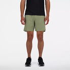 Men's New Balance RC Shorts. Green. Front view.