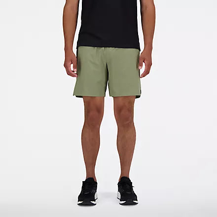 Men's New Balance RC Shorts. Green. Front view.