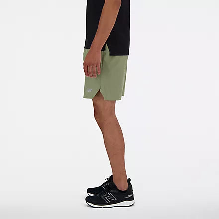 Men's New Balance RC Shorts. Green. Lateral view.