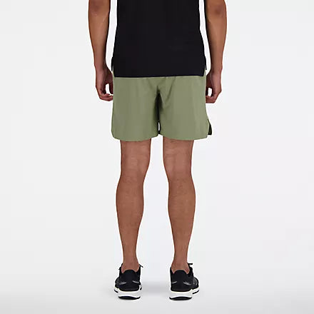 Men's New Balance RC Shorts. Green. Rear view.