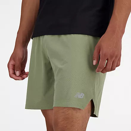 Men's New Balance RC Shorts. Green. Lateral view.