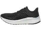 Men's New Balance Vongo V5. Black upper. White midsole. Lateral view.
