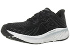 Men's New Balance Vongo V5. Black upper. White midsole. Lateral view.