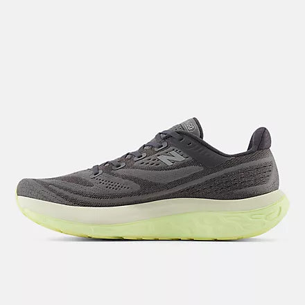 Men's New Balance Vongo v6. Grey upper. Green midsole. Medial view.