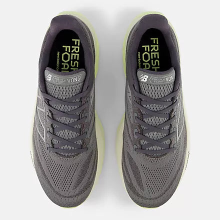 Men's New Balance Vongo v6. Grey upper. Green midsole. Top view.