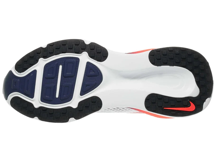 Men's Nike Vomero 18. White upper. Red midsole. Bottom view.