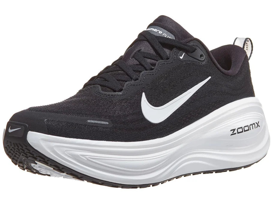 Men's Nike Vomero Plus. Black upper. White midsole. Lateral view.
