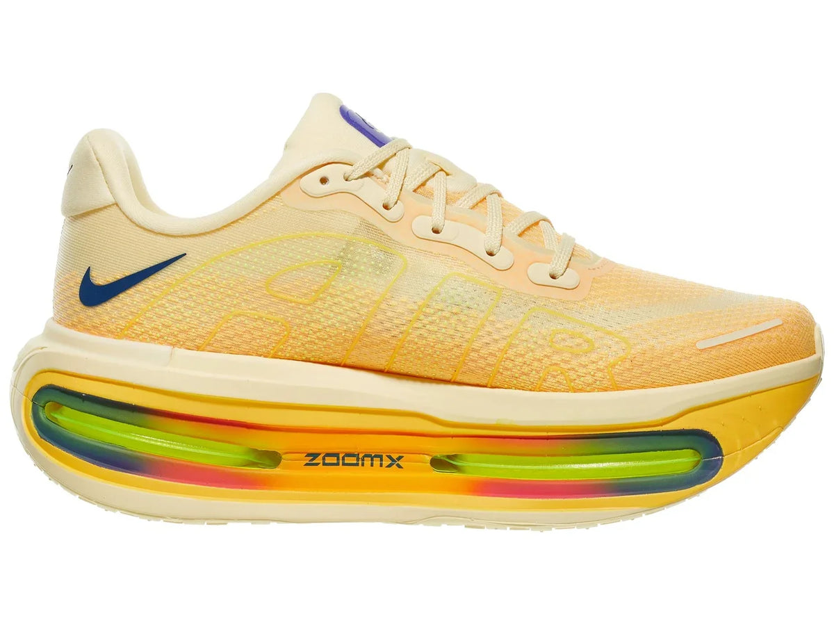Men's Nike Vomero Premium. Orange upper. Cream, orange, rainbow midsole. Medial view.