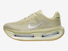 Men's Nike Vomero Premium. Beige upper. Beige midsole. Lateral view.