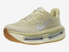 Men's Nike Vomero Premium. Beige upper. Beige midsole. Lateral view.