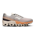 Men's On Cloudmonster 2. Cream and orange upper. Cream and orange midsole. Lateral view.