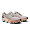 Men's On Cloudmonster 2. Cream and orange upper. Cream and orange midsole. Lateral view.
