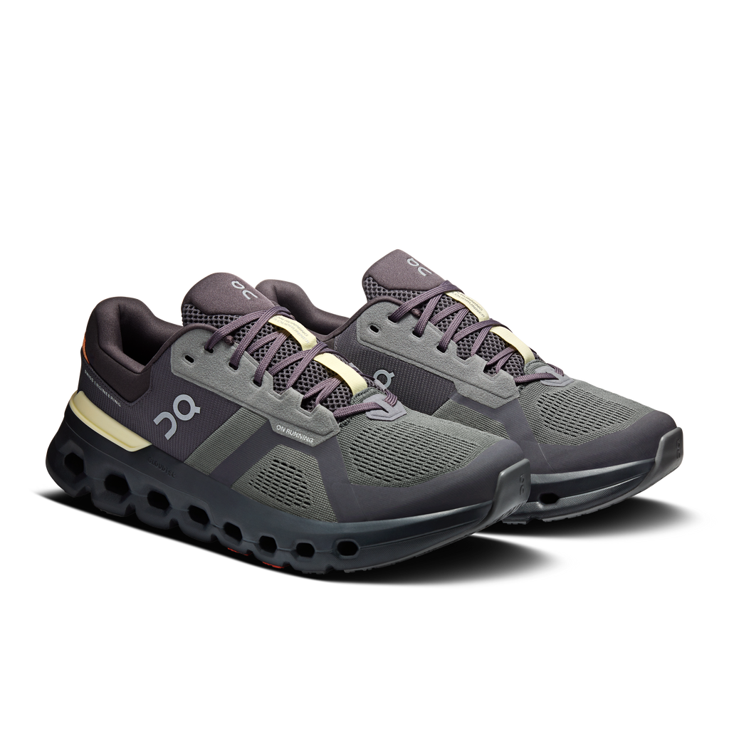 Men's On Cloudrunner 2. Black upper. Black midsole. Lateral view.