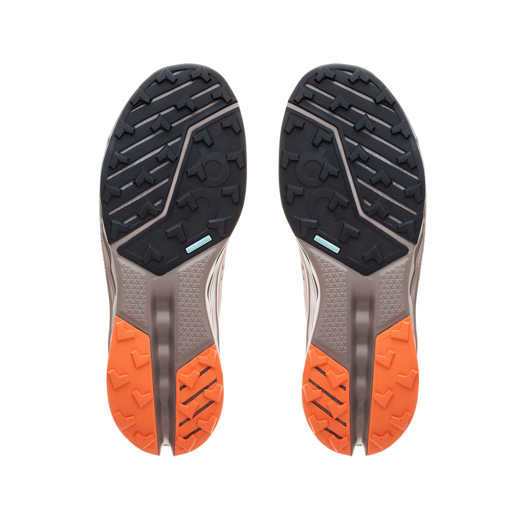 Men's On Cloudsurfer Trail 2. Grey upper. Grey midsole. Bottom view.