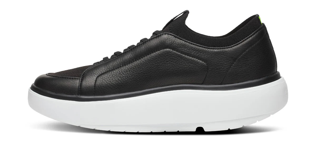 Men's Oofos. Club+. Black upper. White midsole. Medial view.