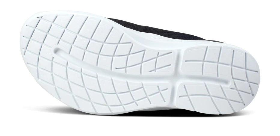 Oofos OOmg Sport LS Shoe. Black upper. White midsole. Bottom view.