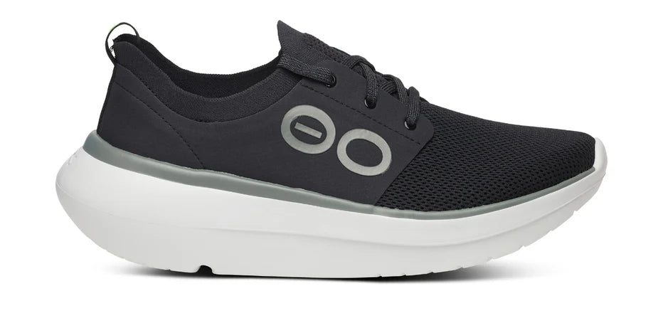 Men's Oofos OOmy Stride. Black upper. White midsole. Lateral view.