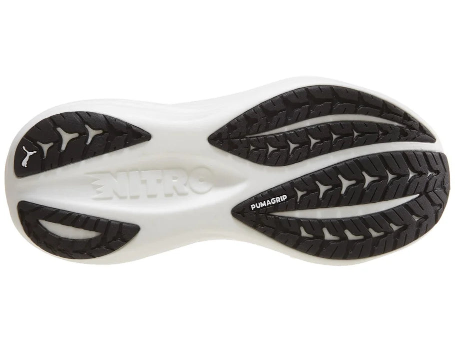 Men's PUMA MagMax Nitro 2. Black upper. White midsole. Bottom view.