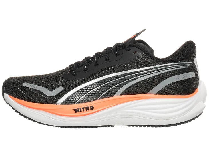 Men's Puma Velocity Nitro 3. Black upper. White/Orange midsole. Lateral view.