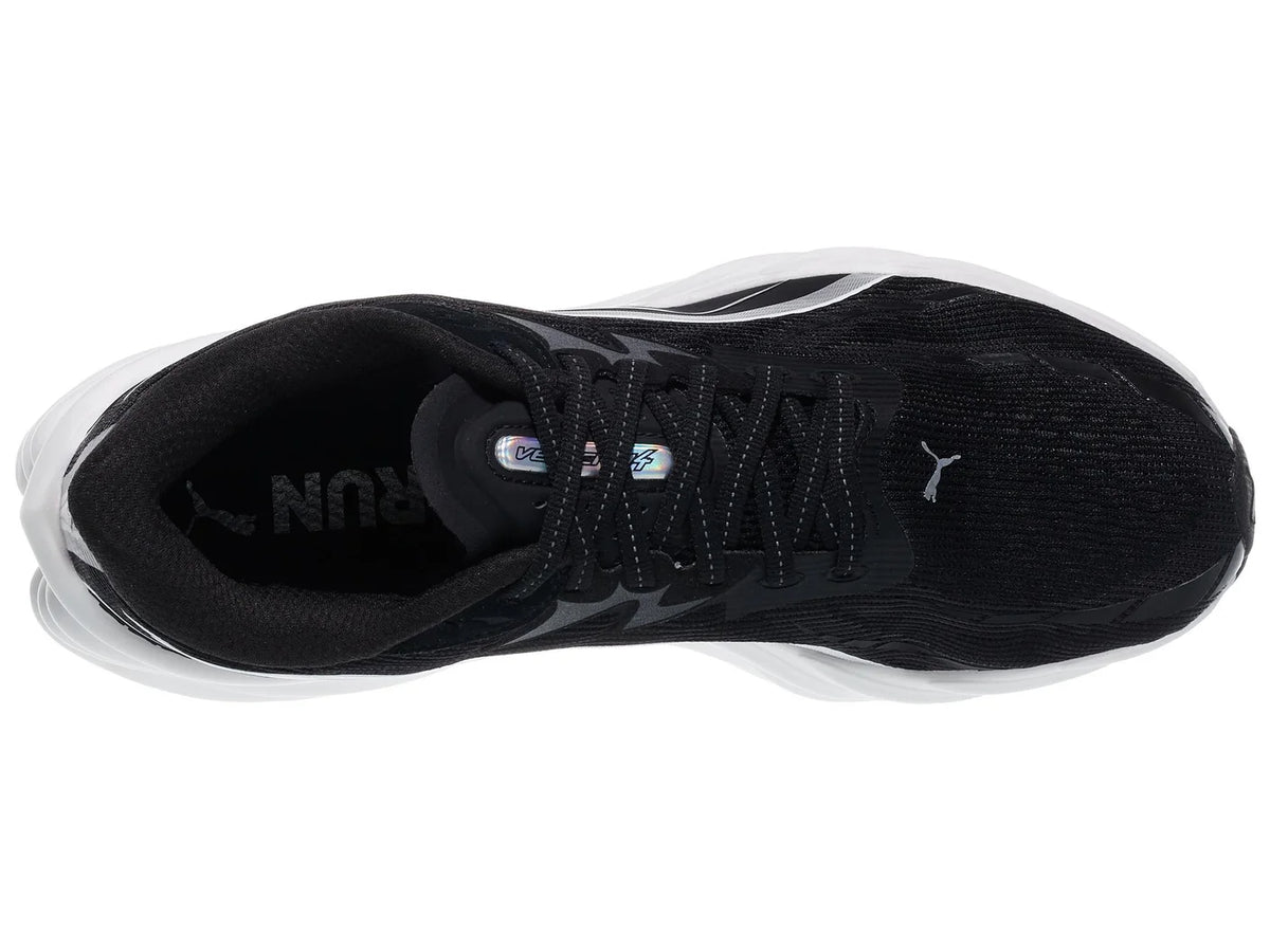 Men's Puma Velocity Nitro 4. Black upper. White midsole. Top view.