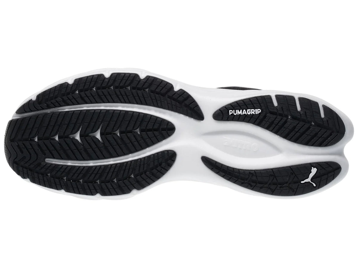 Men's Puma Velocity Nitro 4. Black upper. White midsole. Bottom view.