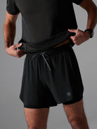 Men's rabbit Pacer Hybrid Shorts 5". Black.