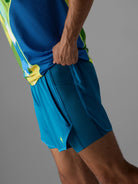 Men's rabbit Pacer Hybrid Shorts 5". Blue.