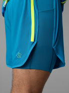 Men's rabbit Pacer Hybrid Shorts 5". Blue.