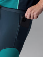 Men's Rabbit Pacer Shorts 8.5in. Navy and turqoise colorway. Side view.