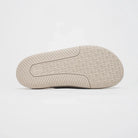 Men's Roll Recovery SUPERPLUSH Flipflop Sandstone outsole view.
