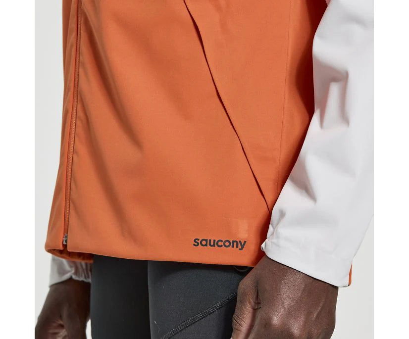 Men's Saucony Boulder Drizzle Jacket. White and orange color way. Front view.