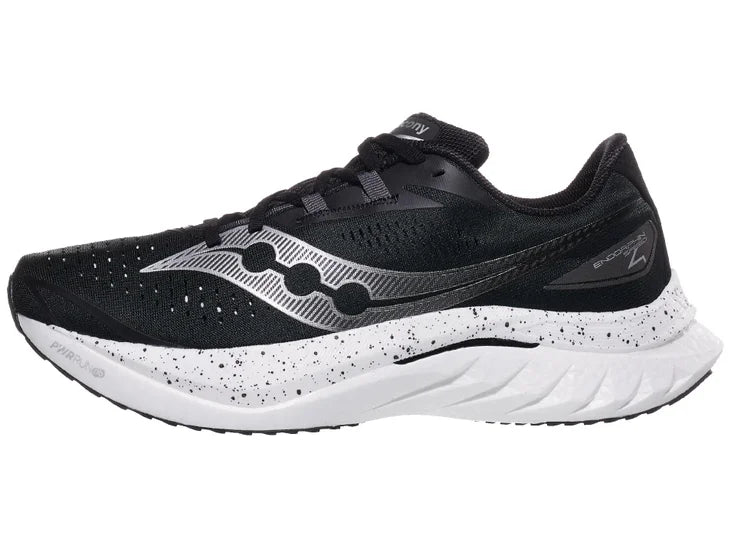 Men's Saucony Endorphin Speed 4. Black upper. White midsole. Lateral view.