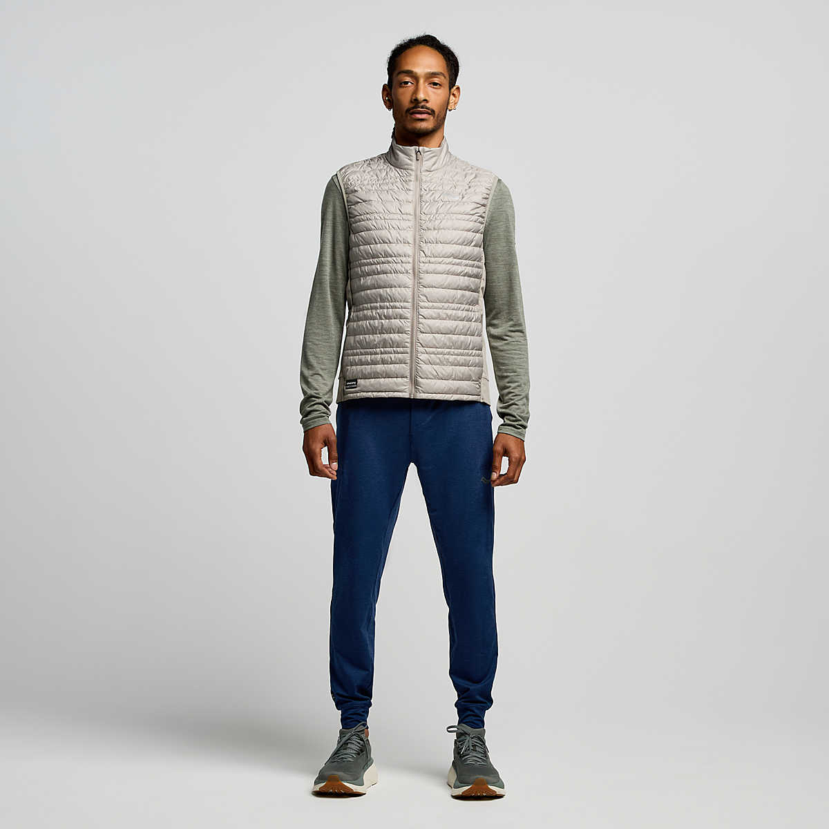 Men's Saucony Hurricane Insulated Vest. Tan. Front view.