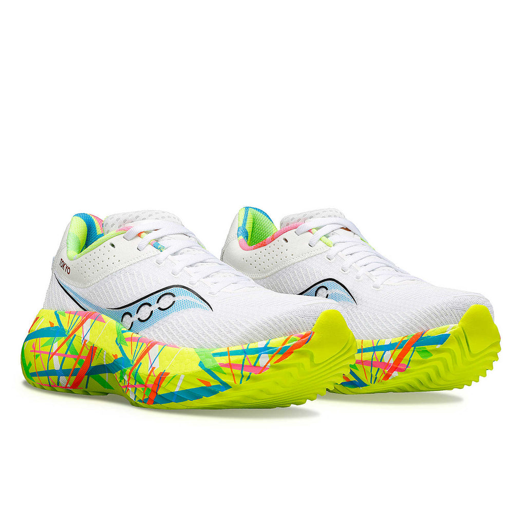 Men's Saucony Kinvara Pro. White upper. Yellow/Multi color midsole. Angled lateral view.