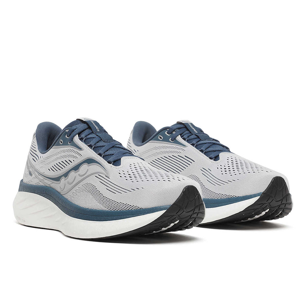 Men's Saucony Ride 18. Grey and blue upper. Blue and white midsole. Lateral view.