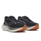 Men's Saucony Ride 19. Black upper. Gold and white midsole. Lateral view.