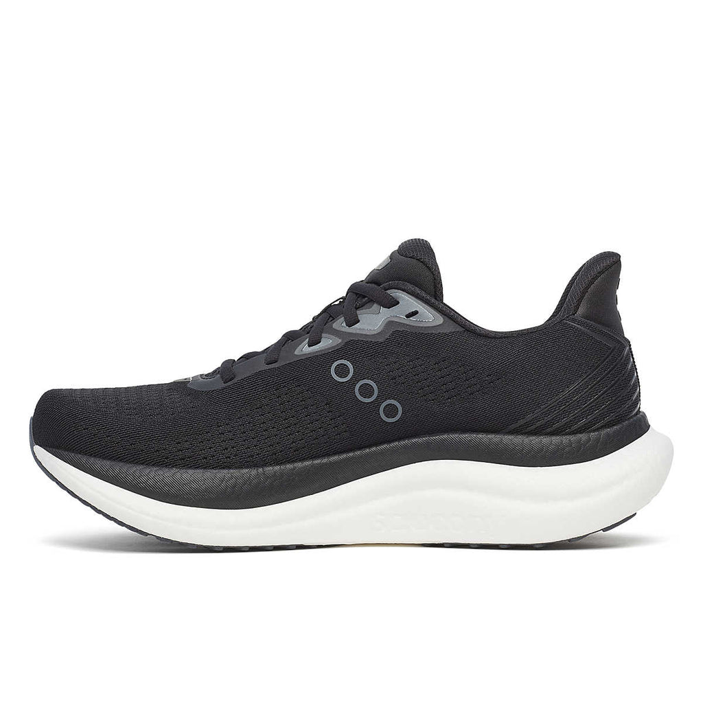 Men's Saucony Triumph 23. Black upper. White midsole. Medial view.