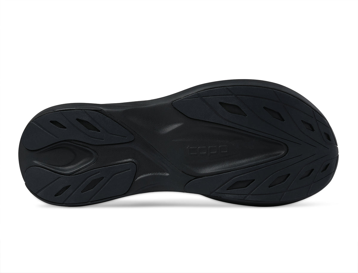 Men's Topo Aura 2. Black upper. Black midsole. Bottom view.