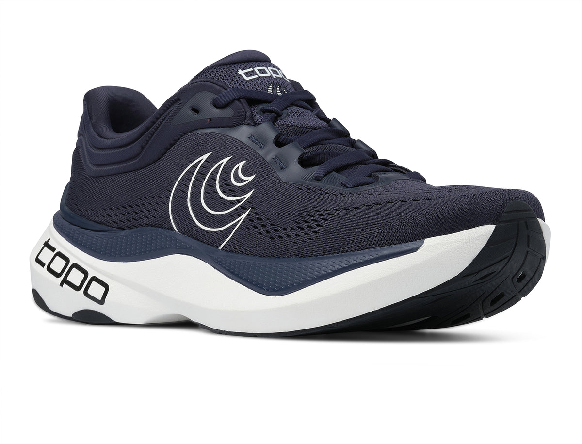 Men's Topo Aura 2. Navy upper. White midsole. Lateral view.