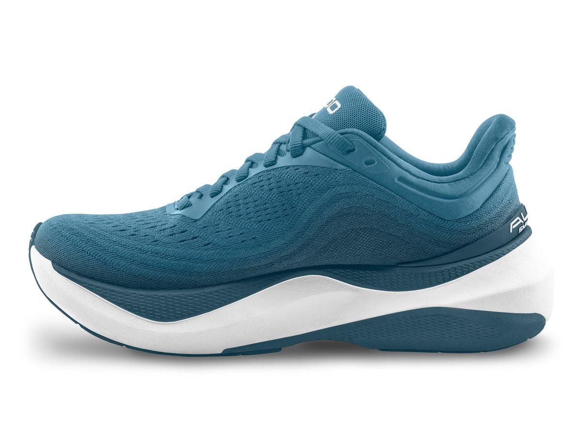 Men's Topo Aura. Blue upper. White midsole. Medial view.