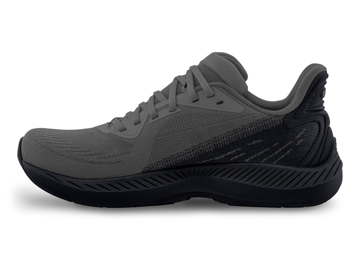 Men's Topo Fli-Lyte 6. Dark Grey upper. Black midsole. Medial view.